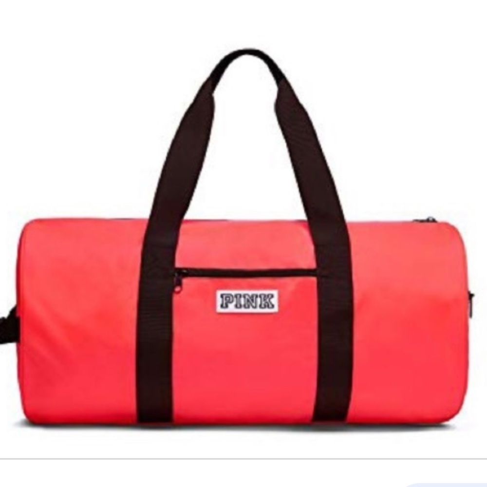 Victoria’s Secret neon orange duffel bag